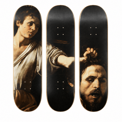 Three skateboard decks arranged vertically side by side, featuring a classical painting print with a woman's face, a hand, and a bearded man's face on a white background.