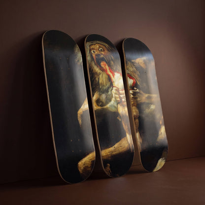 Saturn Devours His Son 3 deck skateboard wall art leaning against a walnut brown wall